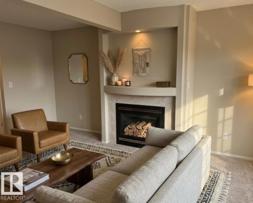 50 9630 176 Street, Edmonton, AB - Indoor Photo Showing Living Room With Fireplace