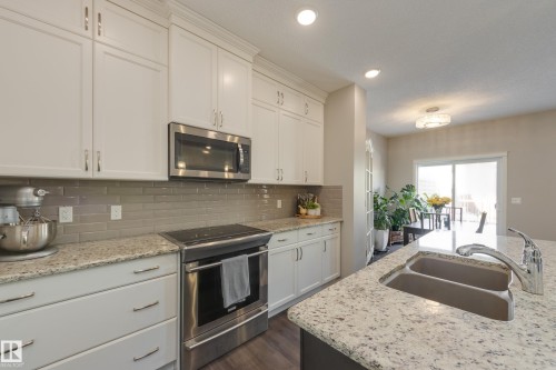12228 176 Avenue, Edmonton, AB - Indoor Photo Showing Kitchen With Double Sink With Upgraded Kitchen