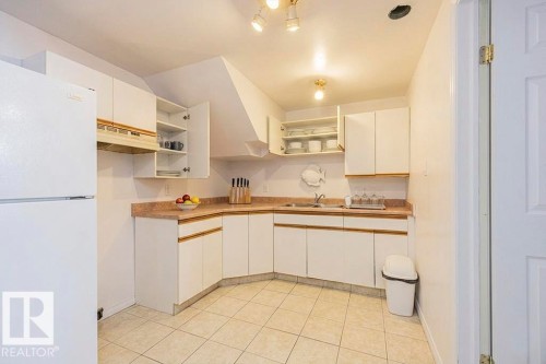 9827 152 Street, Edmonton, AB - Indoor Photo Showing Kitchen With Double Sink