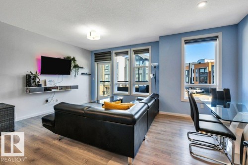 105 1304 Rutherford Rd Road, Edmonton, AB - Indoor Photo Showing Living Room