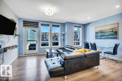 105 1304 Rutherford Rd Road, Edmonton, AB - Indoor Photo Showing Living Room