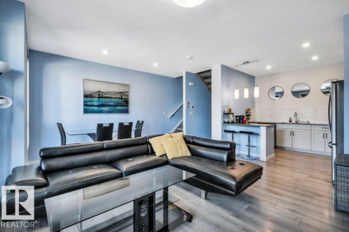 105 1304 Rutherford Rd Road, Edmonton, AB - Indoor Photo Showing Living Room