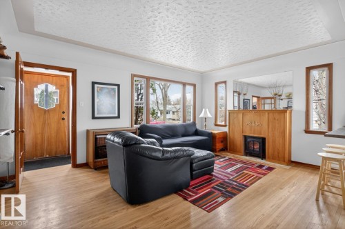 12130 60 Street, Edmonton, AB - Indoor Photo Showing Living Room With Fireplace