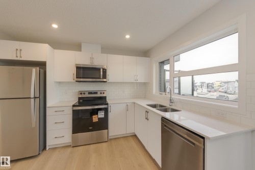 17226 4 Street Nw, Edmonton, AB - Indoor Photo Showing Kitchen With Stainless Steel Kitchen With Double Sink