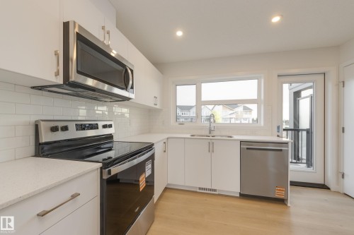 17226 4 Street Nw, Edmonton, AB - Indoor Photo Showing Kitchen With Stainless Steel Kitchen