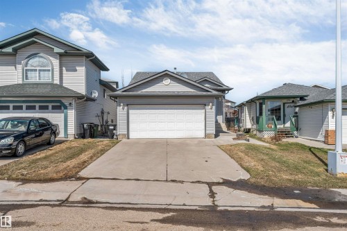 Single-story residence featuring a two-car garage with a concrete driveway - 4812 148 Avenue, Edmonton, AB - Outdoor With Facade