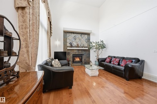 1198 Hollands Way, Edmonton, AB - Indoor Photo Showing Living Room With Fireplace