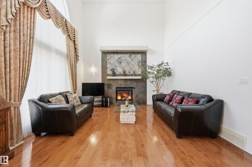 1198 Hollands Way, Edmonton, AB - Indoor Photo Showing Living Room With Fireplace