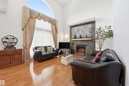 1198 Hollands Way, Edmonton, AB - Indoor Photo Showing Living Room With Fireplace