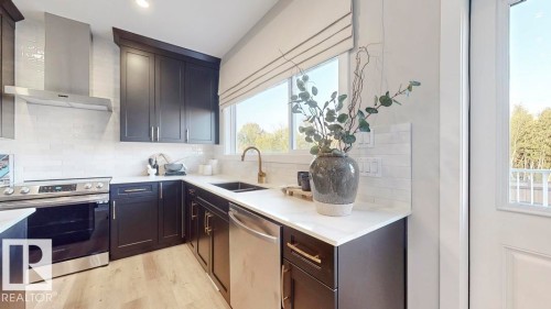 5892 Raven Crescent, Edmonton, AB - Indoor Photo Showing Kitchen With Double Sink With Upgraded Kitchen