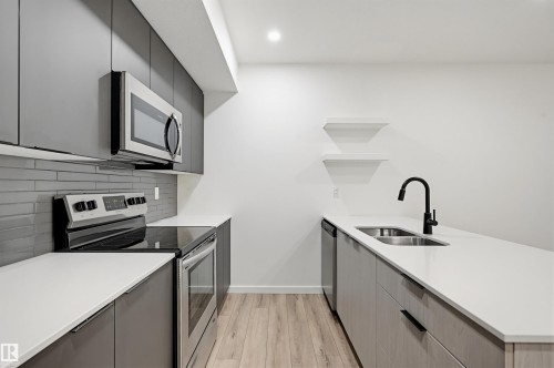 8518 79 Avenue, Edmonton, AB - Indoor Photo Showing Kitchen With Double Sink