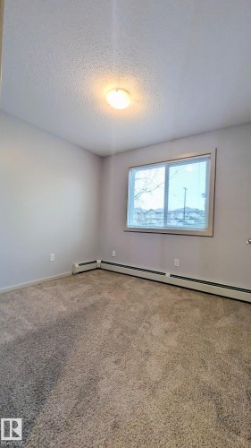 120 5404 7 Avenue, Edmonton, AB - Indoor Photo Showing Other Room