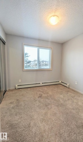 120 5404 7 Avenue, Edmonton, AB - Indoor Photo Showing Other Room