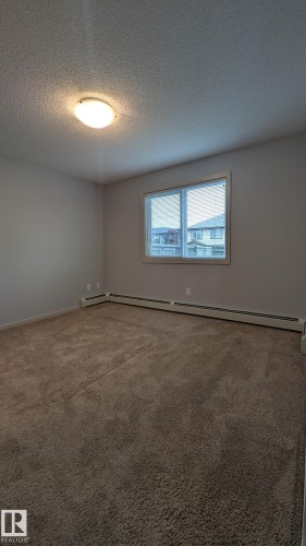 120 5404 7 Avenue, Edmonton, AB - Indoor Photo Showing Other Room