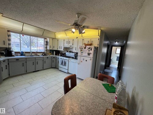 10723 108 Avenue, Westlock, AB - Indoor Photo Showing Kitchen With Double Sink