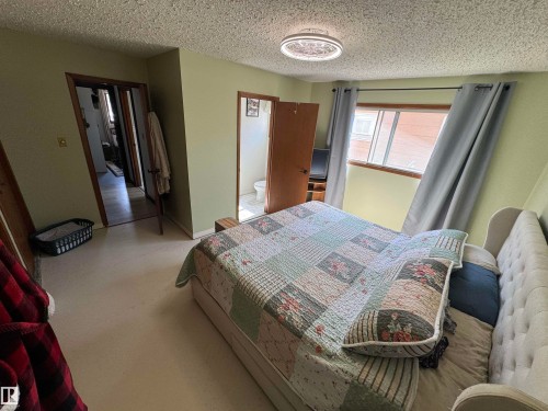 10723 108 Avenue, Westlock, AB - Indoor Photo Showing Bedroom