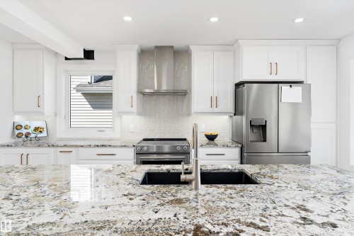 9448 76 Street, Edmonton, AB - Indoor Photo Showing Kitchen With Double Sink With Upgraded Kitchen