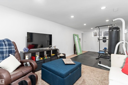 9448 76 Street, Edmonton, AB - Indoor Photo Showing Gym Room
