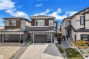 Contemporary home with a multi-textured facade including siding and stone accents - 1809 18A Avenue, Edmonton, AB  - Outdoor With Facade 