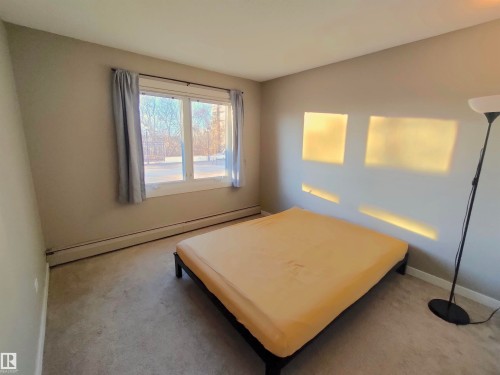 101 9737 112 Street, Edmonton, AB - Indoor Photo Showing Bedroom