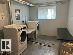 Dedicated laundry area featuring front-loading and top-loading appliances, a utility sink, and a window for natural light - 