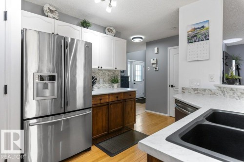 8938 179A Avenue, Edmonton, AB - Indoor Photo Showing Kitchen With Double Sink