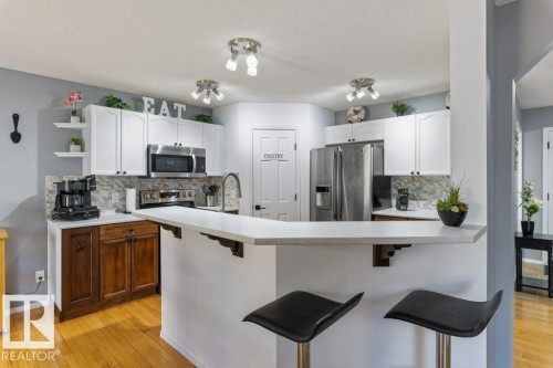 8938 179A Avenue, Edmonton, AB - Indoor Photo Showing Kitchen With Upgraded Kitchen