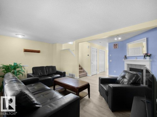 4519 149 Avenue, Edmonton, AB - Indoor Photo Showing Living Room With Fireplace