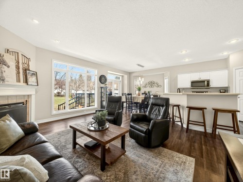 7 Oakbay Point(E), St. Albert, AB - Indoor Photo Showing Living Room With Fireplace
