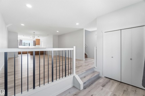 Entryway featuring light wood-finish flooring, white walls, and a bi-fold closet - 22371 93 Avenue, Edmonton, AB - Indoor Photo Showing Other Room