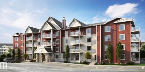 Multi-story residential building featuring a red and beige exterior with multiple gables - #204 2225 44 Av Nw, Edmonton, AB - Outdoor With Facade