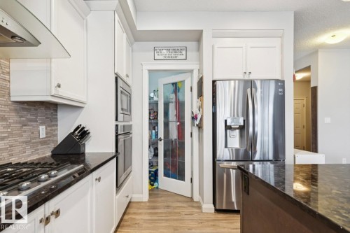 1351 Secord Landing Landing, Edmonton, AB - Indoor Photo Showing Kitchen With Stainless Steel Kitchen With Upgraded Kitchen