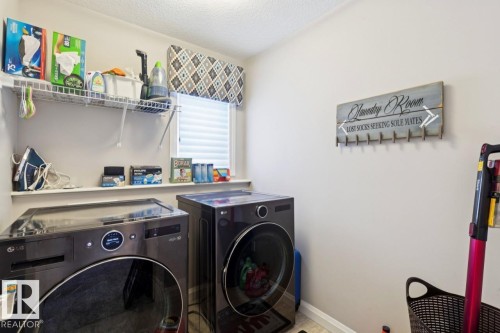 1351 Secord Landing Landing, Edmonton, AB - Indoor Photo Showing Laundry Room