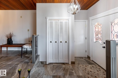 Entryway featuring wood plank ceiling, contemporary overhead lighting, and grey-toned tile flooring - 16536 103 Street, Edmonton, AB - Indoor Photo Showing Other Room