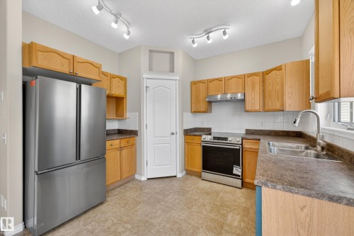 4989 Thibault Way, Edmonton, AB - Indoor Photo Showing Kitchen With Double Sink
