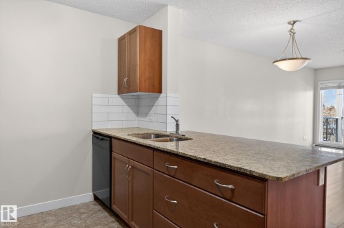 309 12660 142 Avenue, Edmonton, AB - Indoor Photo Showing Kitchen With Double Sink