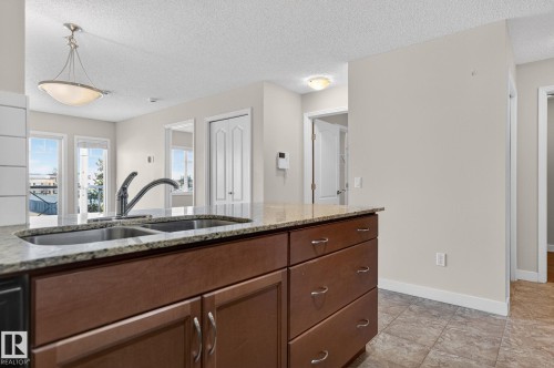 309 12660 142 Avenue, Edmonton, AB - Indoor Photo Showing Kitchen With Double Sink