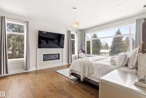 12420 Grand View Drive, Edmonton, AB - Indoor Photo Showing Bedroom With Fireplace