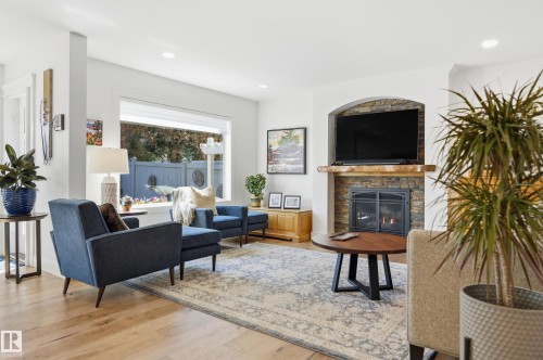 6 Cormack Crescent, Edmonton, AB - Indoor Photo Showing Living Room With Fireplace