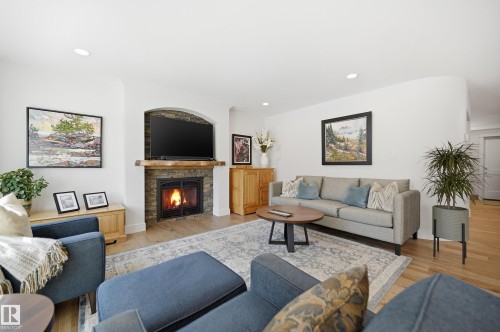 6 Cormack Crescent, Edmonton, AB - Indoor Photo Showing Living Room With Fireplace