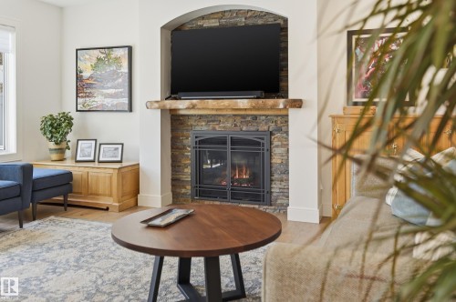 6 Cormack Crescent, Edmonton, AB - Indoor Photo Showing Living Room With Fireplace