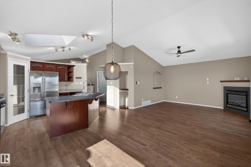 3779 18 Street, Edmonton, AB - Indoor Photo Showing Kitchen With Fireplace