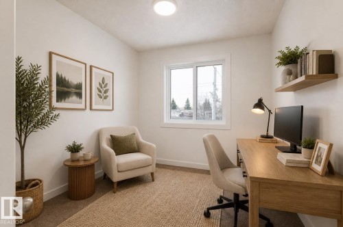 Compact room featuring light-colored walls and carpet flooring - #63 1033 Youville Dr W Nw, Edmonton, AB - Indoor Photo Showing Office