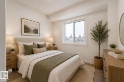 Bedroom featuring a large window, neutral wall paint, and recessed lighting - 