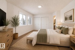 Bright interior room with multiple windows, two sets of bifold closet doors, a neutral wall color, and recessed ceiling lighting - 
