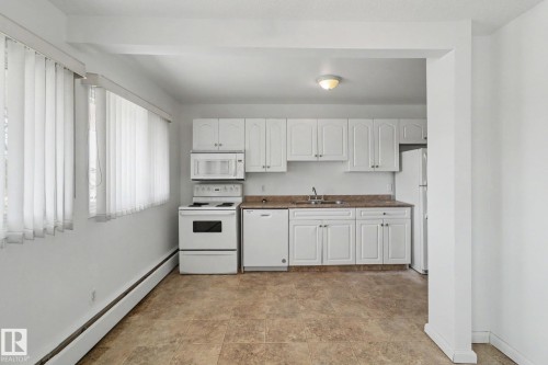 604F 2908 116A Avenue Nw, Edmonton, AB - Indoor Photo Showing Kitchen With Double Sink