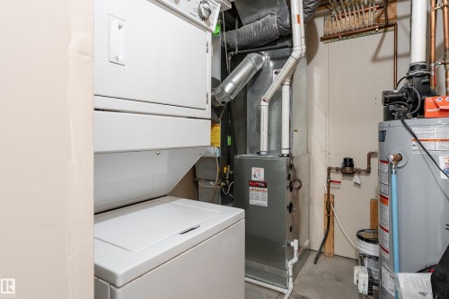 17 5260 Terwillegar Boulevard, Edmonton, AB - Indoor Photo Showing Laundry Room