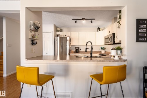1-30 Levasseur Road, St. Albert, AB - Indoor Photo Showing Kitchen With Double Sink