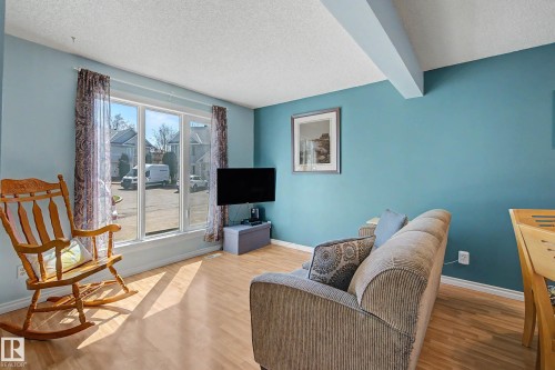 129 5 Aberdeen Way, Stony Plain, AB - Indoor Photo Showing Living Room