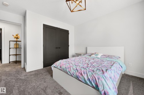 8207 101 Avenue Nw, Edmonton, AB - Indoor Photo Showing Bedroom